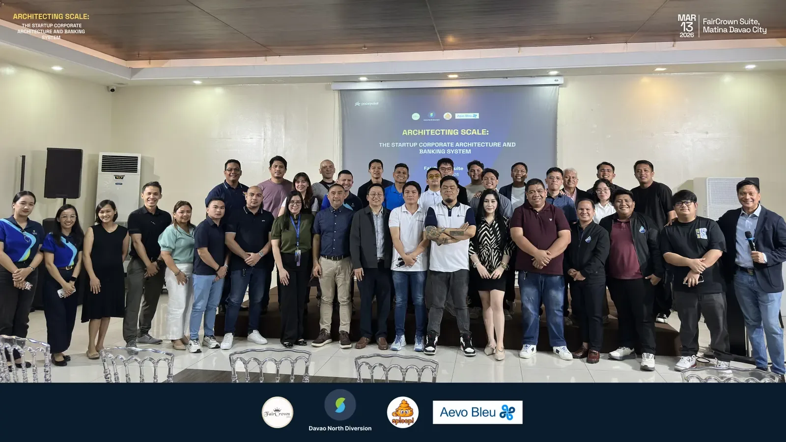 Architecting Scale — visual system on stage at FairCrown Suite