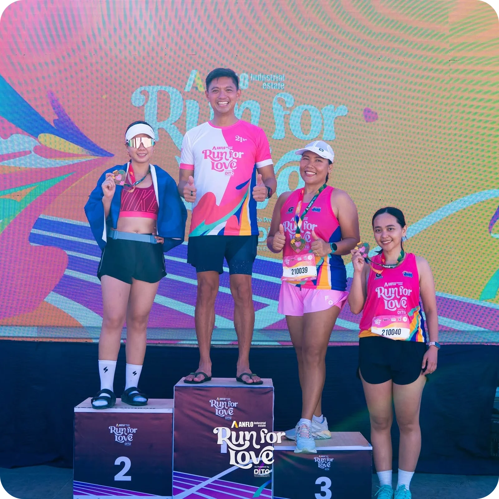 Run for Love — category winners on the branded awarding podium