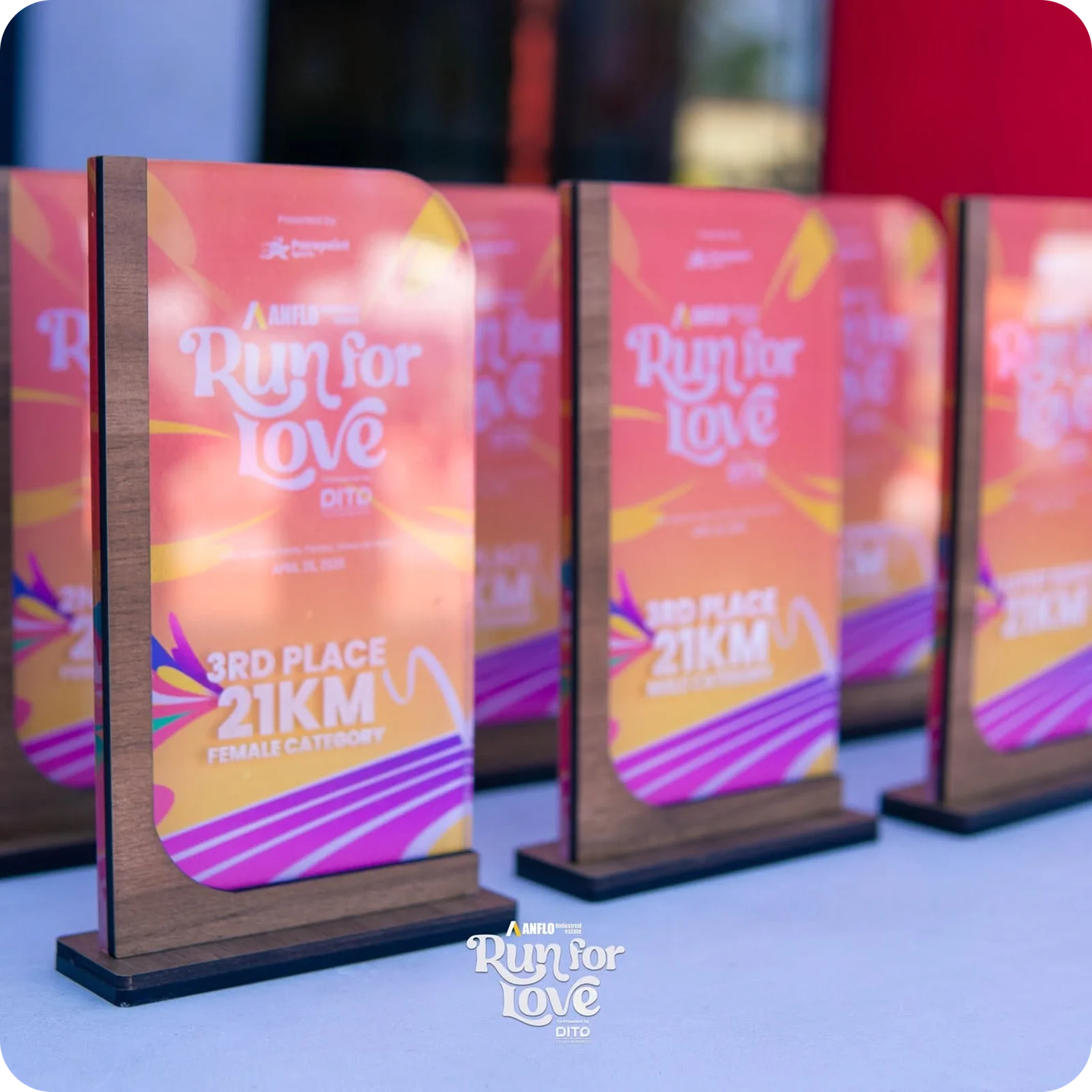 Run for Love — branded acrylic trophies for the podium placers